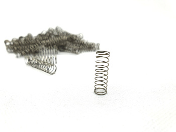 Фото Пружина ролика подачи 302RV09130 Kyocera P2235dn,P2335d P2040dn, M2135dn, M2635dn, M2735dw, M2040dn 302RV09130